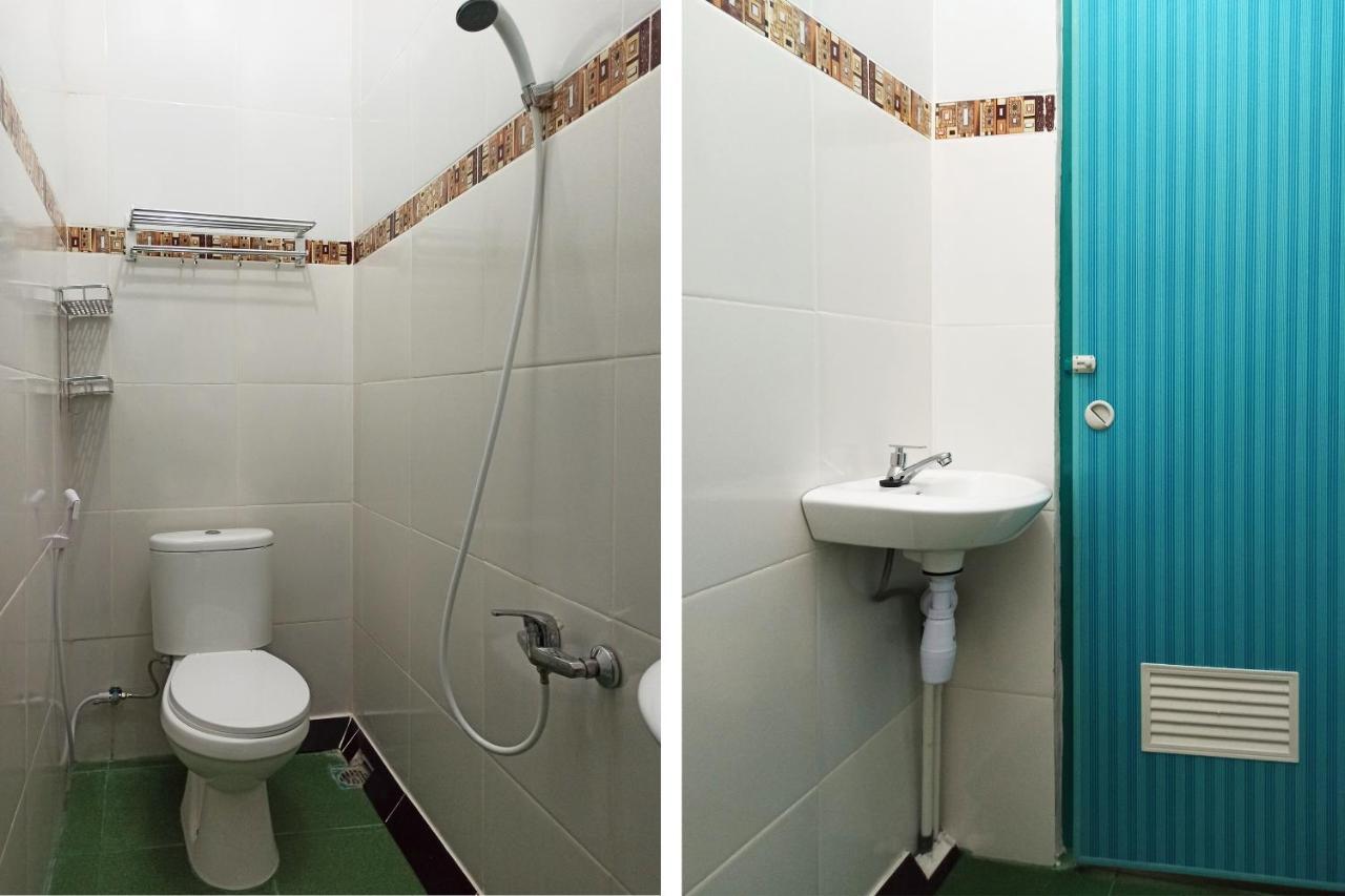 Oyo 2611 Hotel Krui Syariah Buitenkant foto